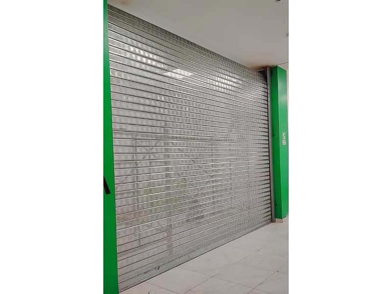 Puerta Garaje de Lamas de Madera
